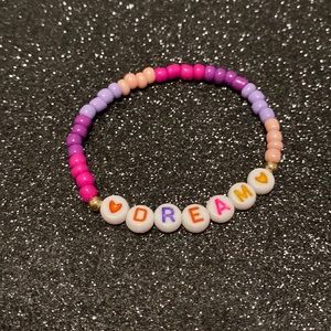 Kids multi purple bead friendship stretch bracelet
